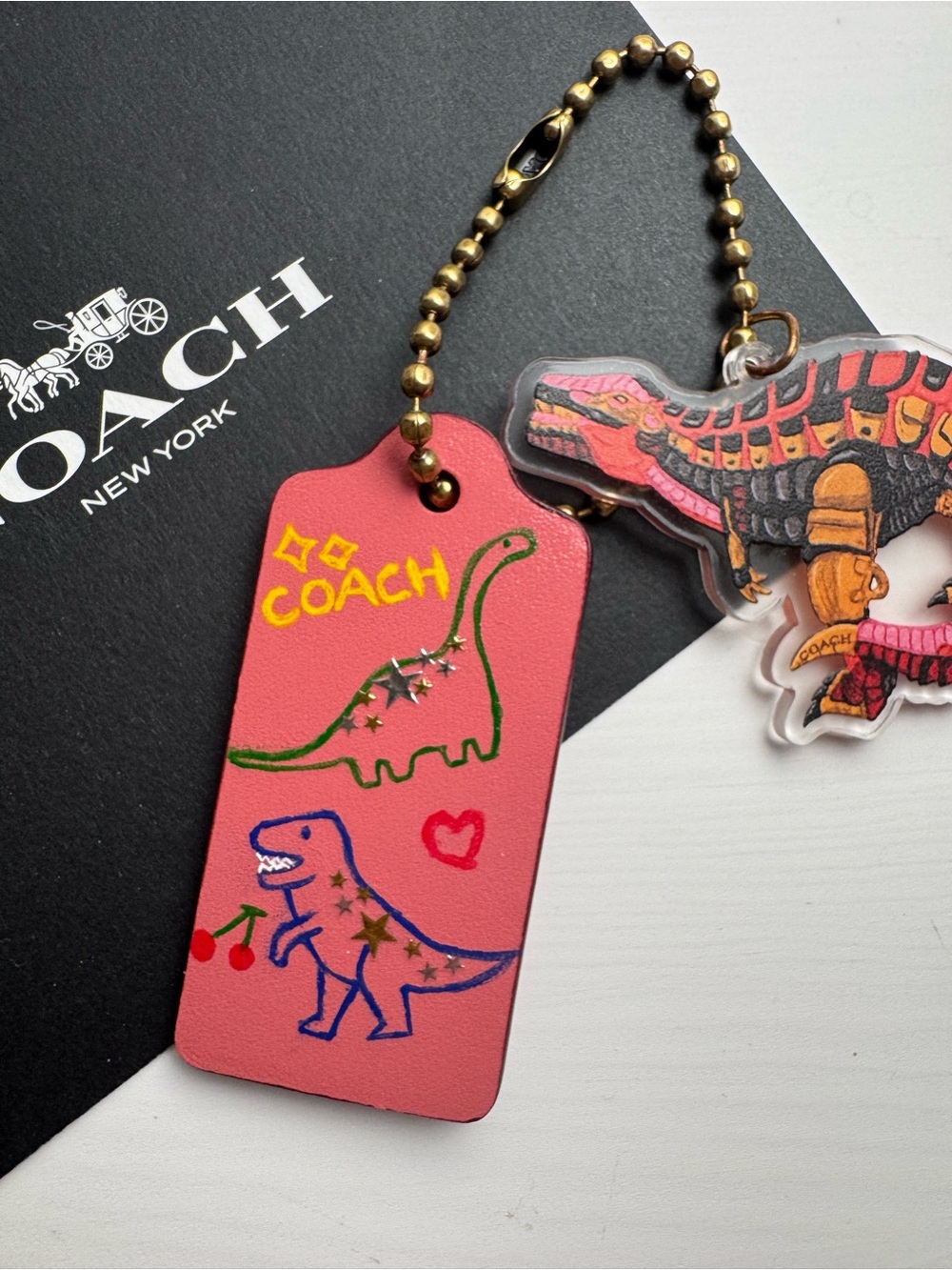Sold Coach pink dinosaur rexy keychain hangtag charm
